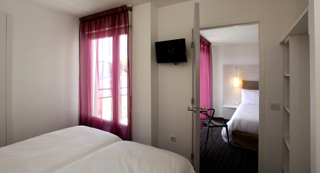 فندق كيبِروفي  فندق إيبيس ستايلز كويبيرون سنتر الغرفة الصورة